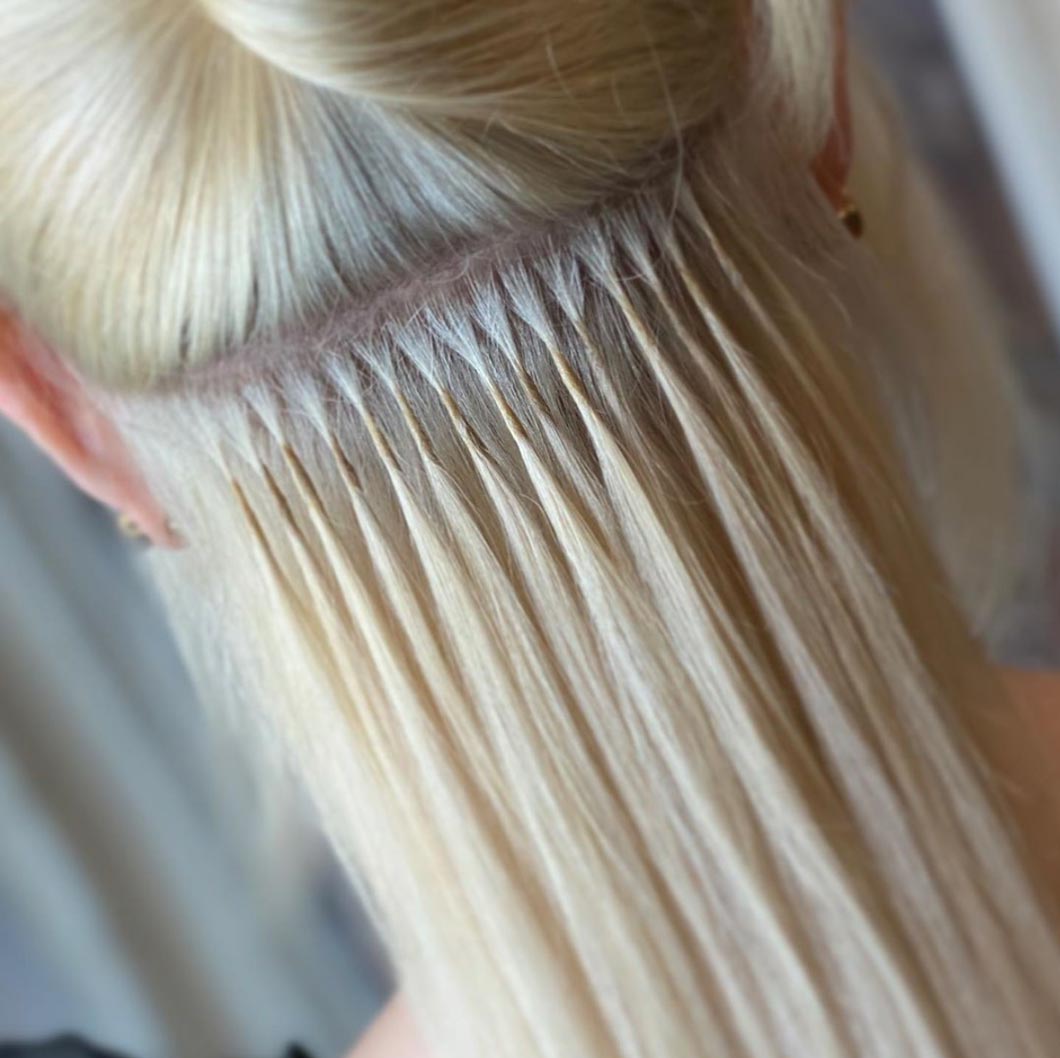 A row of Great Lengths hair extension bonded by @ hairbykirbyblythe